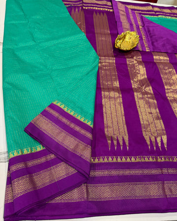 LD-NG25
 sea green and purple border saree