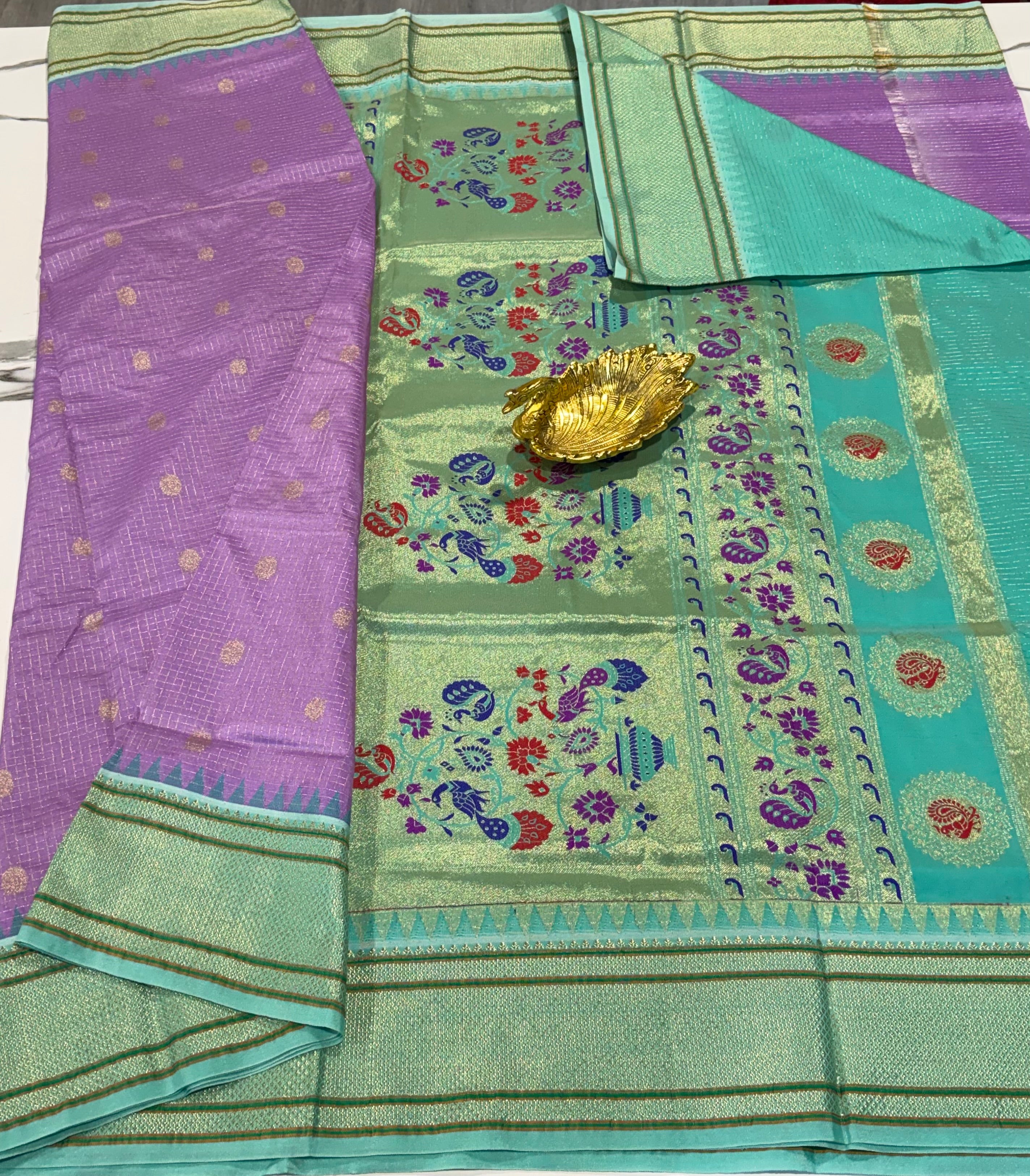 LD-SN35 
lavender n sea green border saree