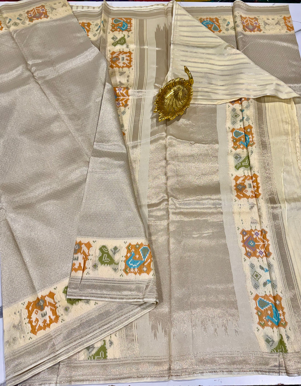 P-4900 cream Patola tissue saree