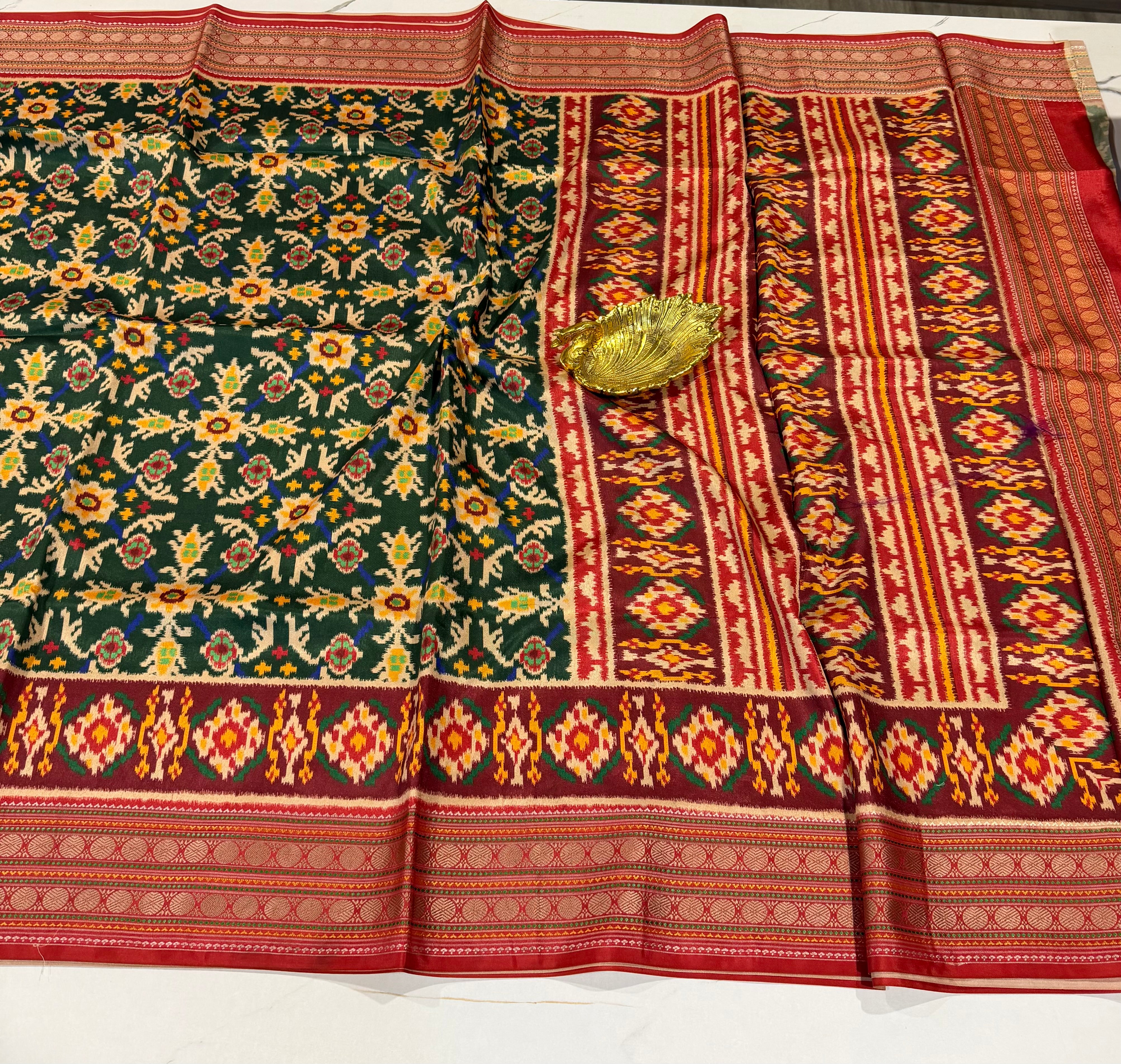 LD-1399 Rudraksha borders spun Patola green saree