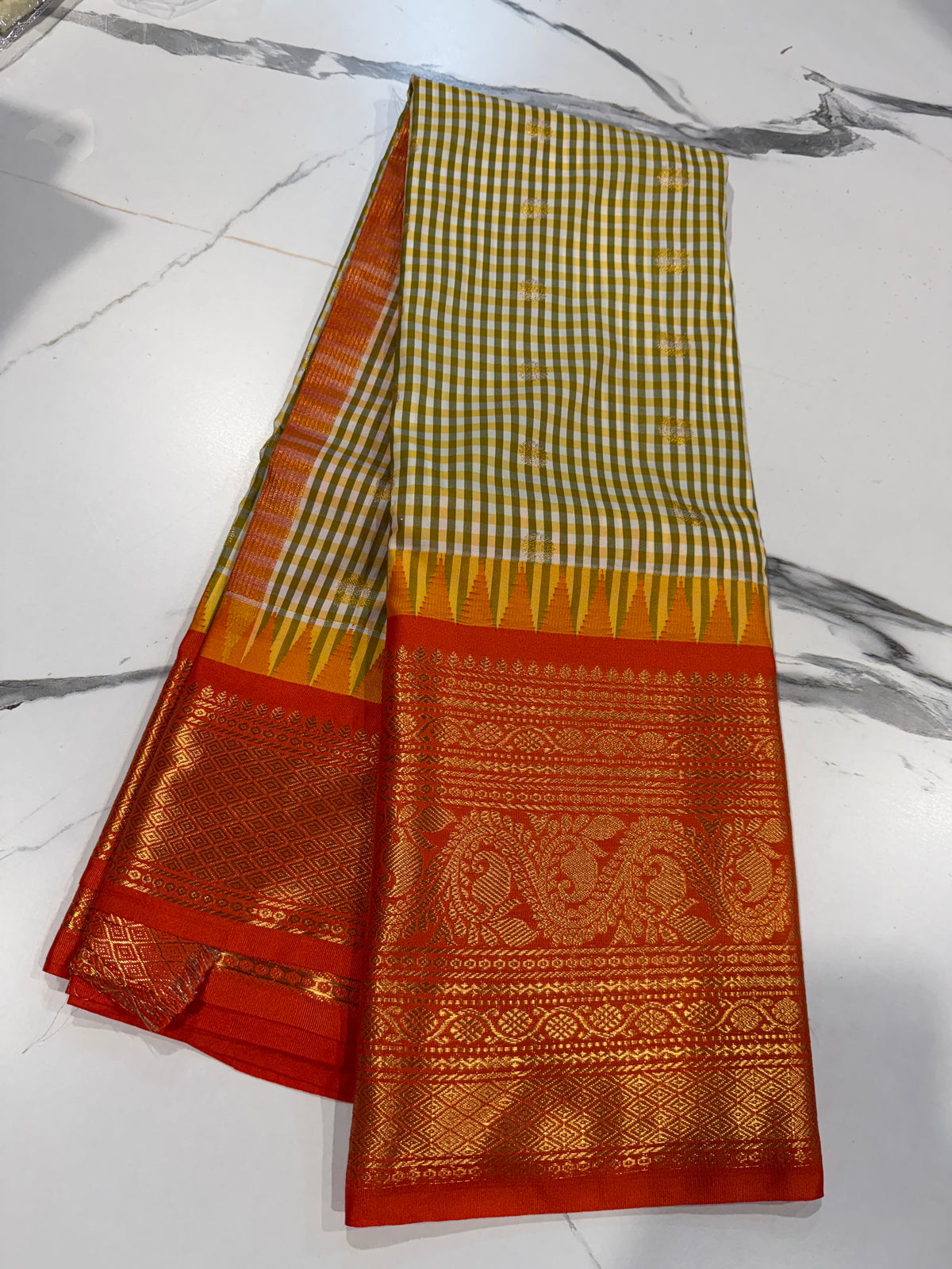 SGC-2500 Madras checks gadwal Green & Orange border saree