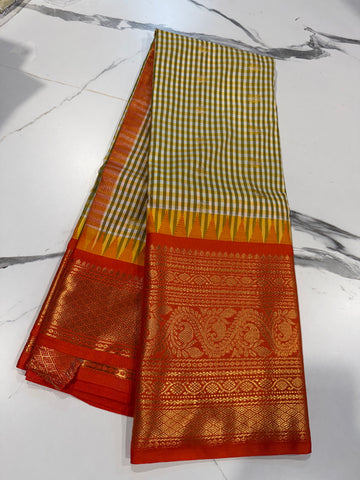 SGC-2500 Madras checks gadwal Green & Orange border saree