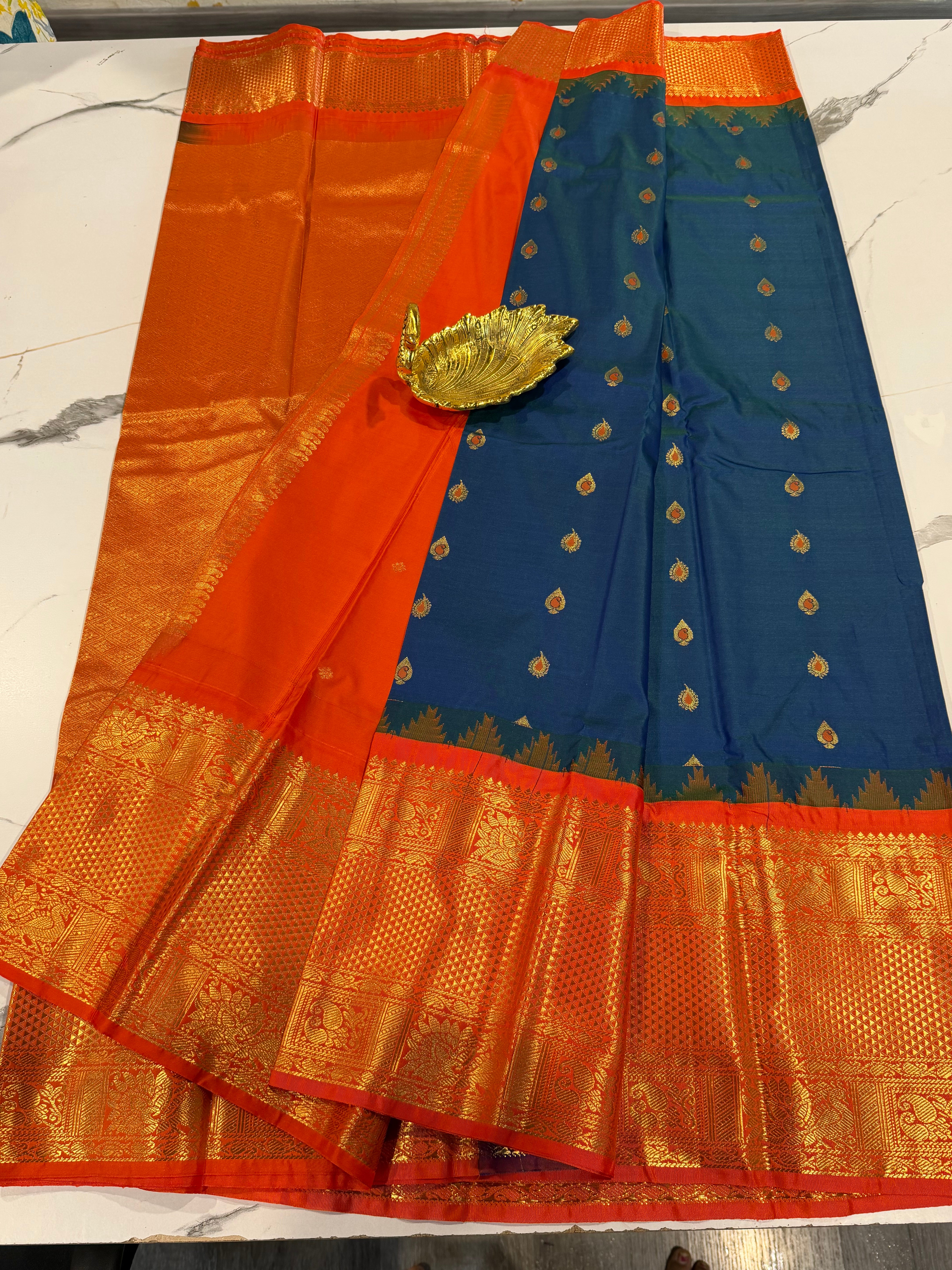 VG2 semi Gadwal peacock blue and orange border saree