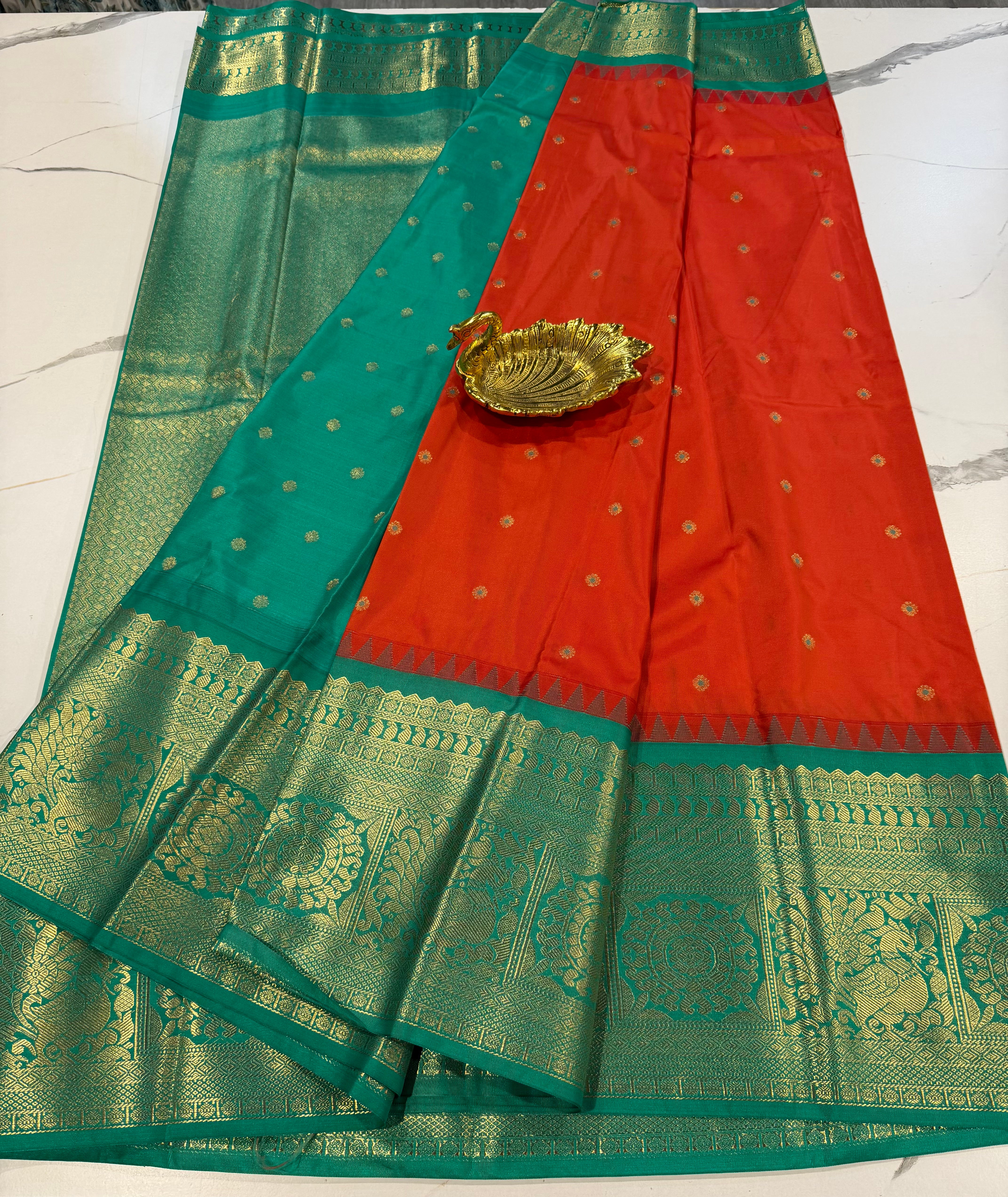 VG2 semi gadwal orange and green border saree