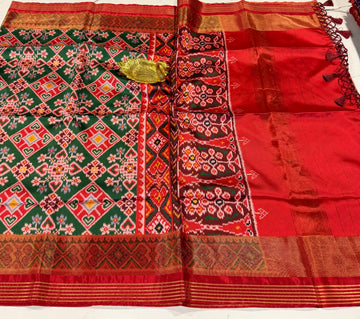LD-1350 Navrathan patola tissue borders green saree