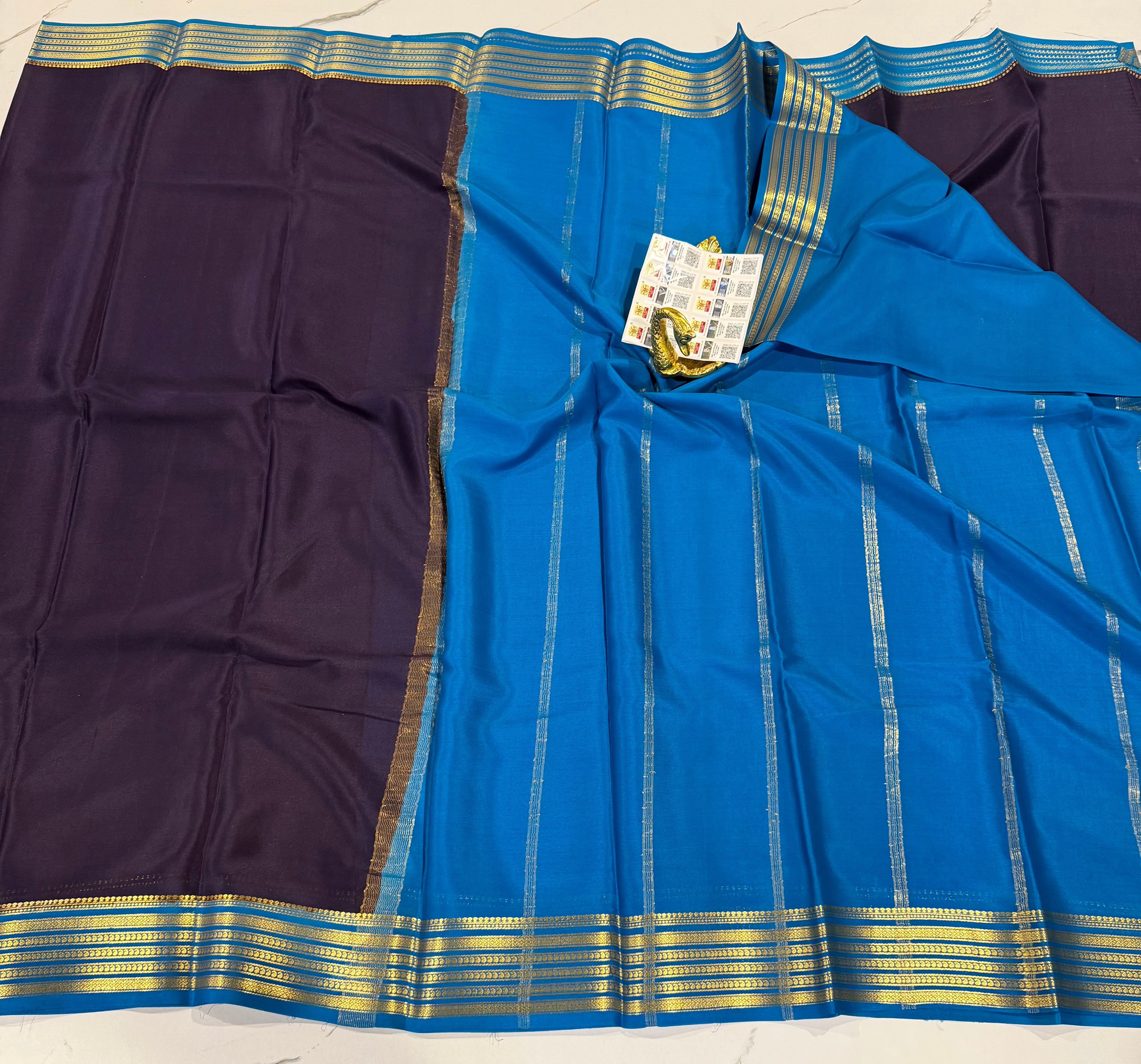 PM- 5700 brinjal and Krishna blue border Mysore crepe silk saree