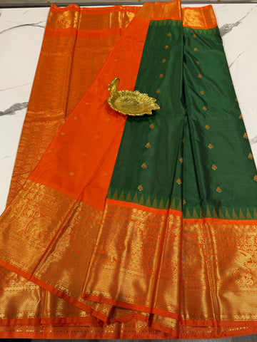 VG2 semi Gadwal dark green and orange saree