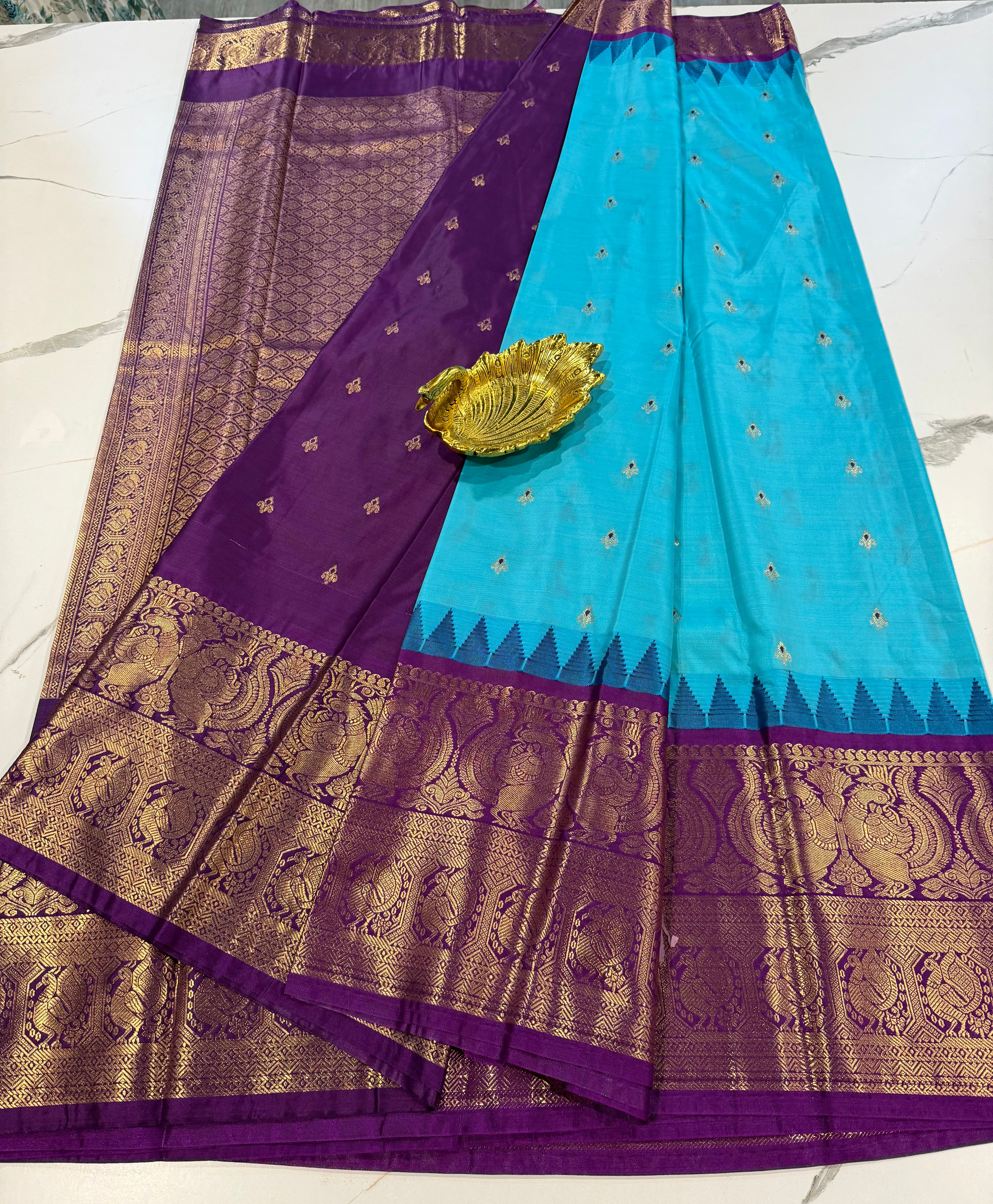 VG2 semi gadwal sky blue and purple border saree