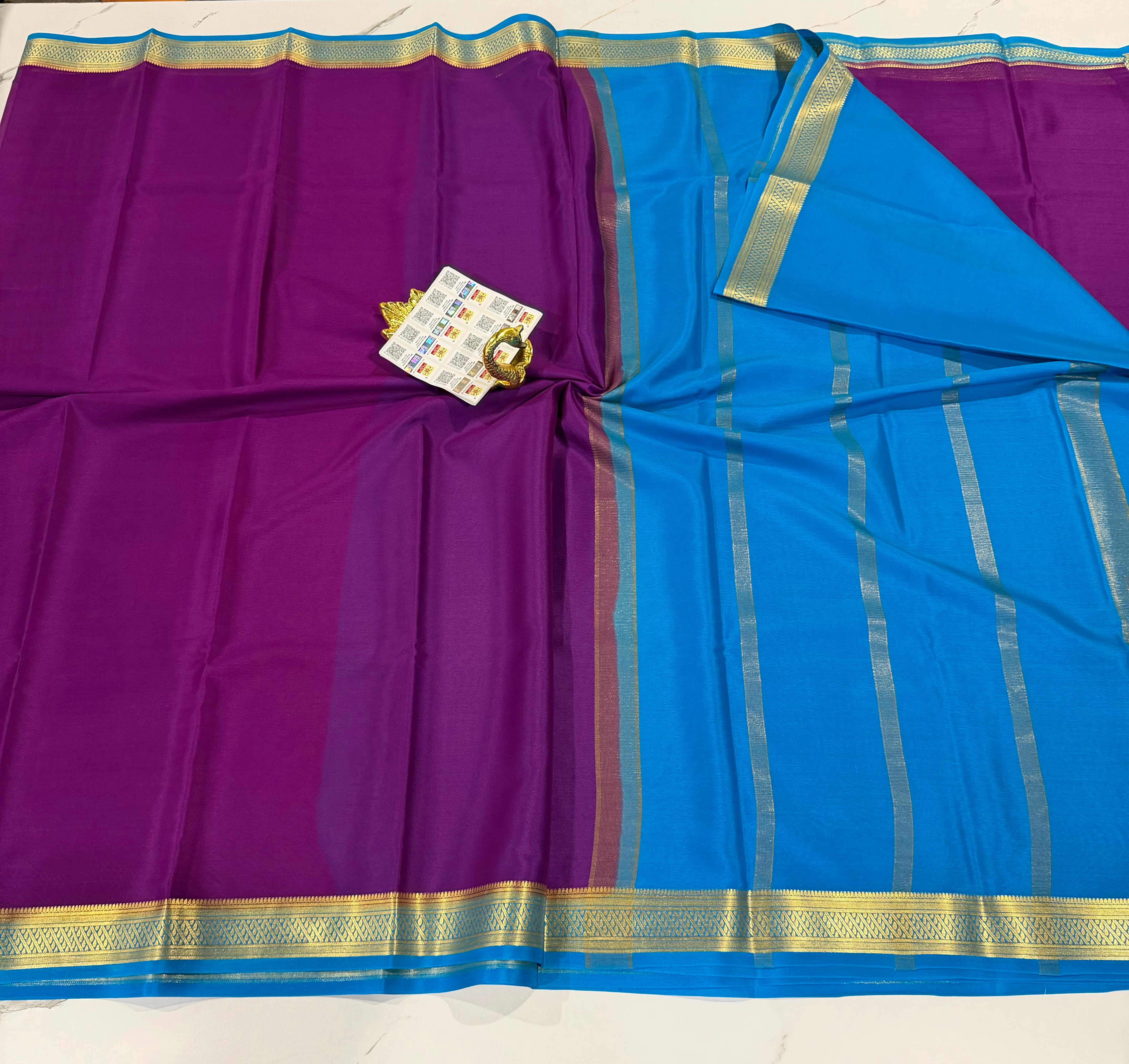 PM- 5700 purple and krishna blue border Mysore crepe silk saree
