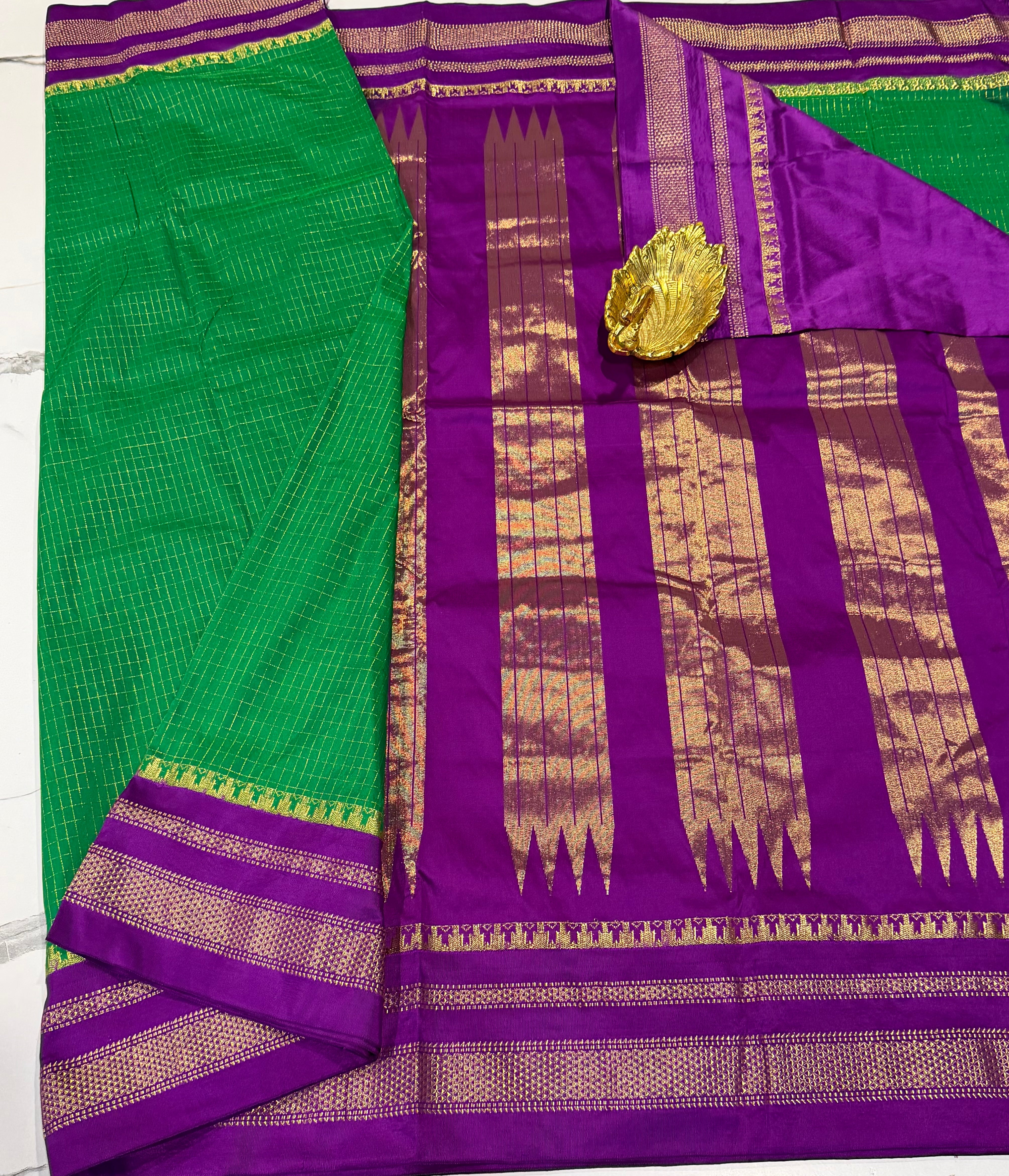 LD-NG25
 green and purple border saree