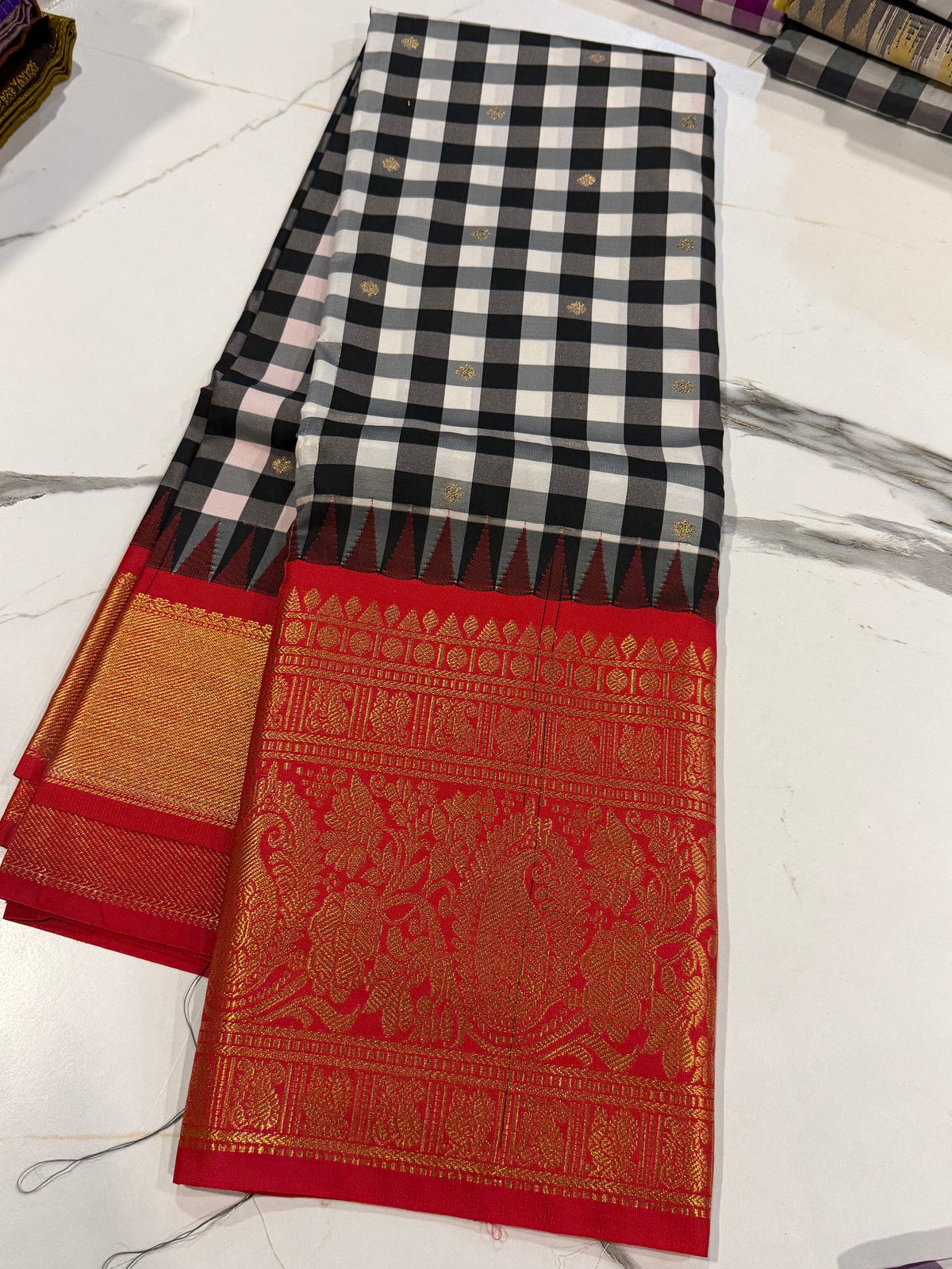 SGC-2500 Madras checks gadwal black and Red border saree