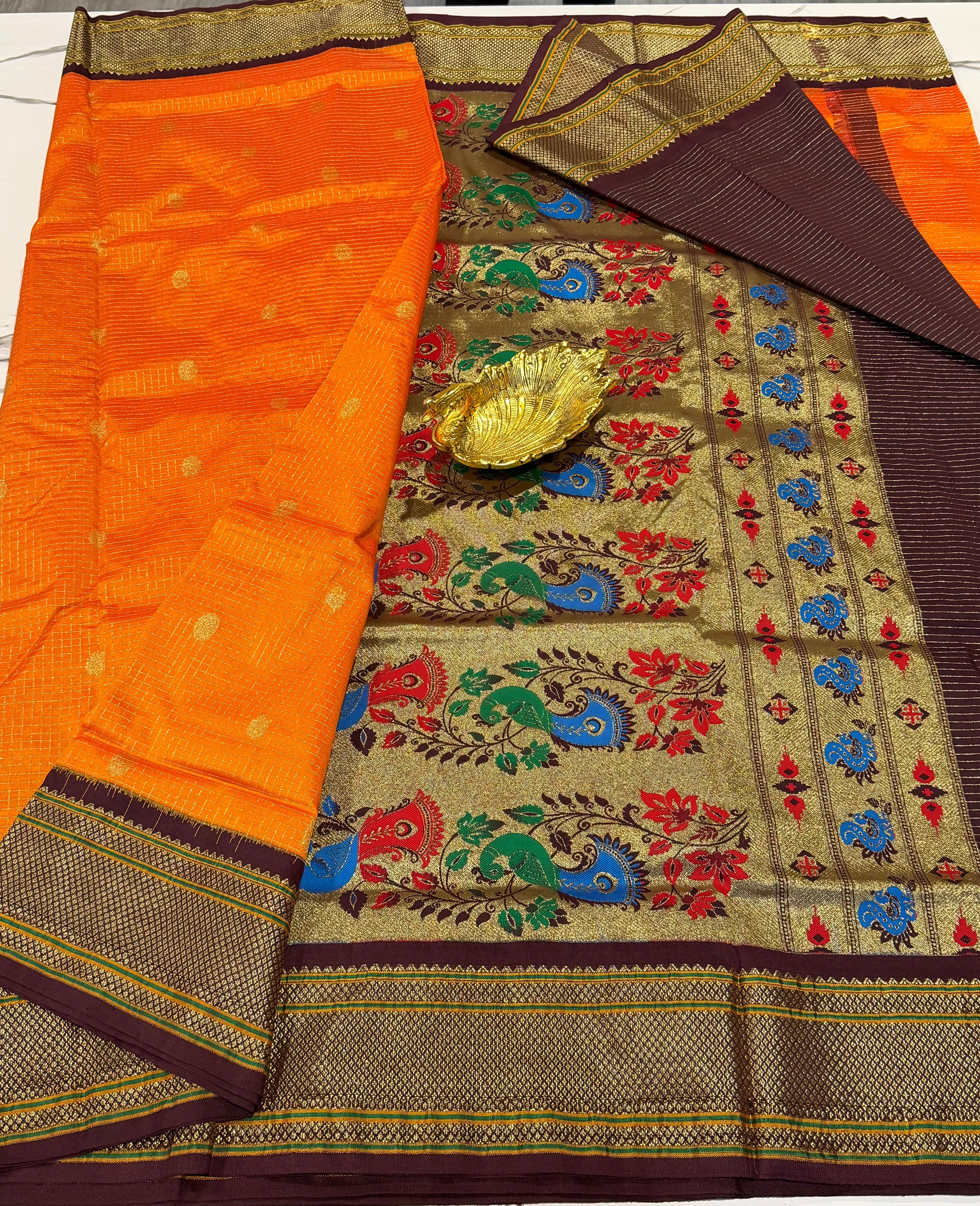 LD-SN35 
orange colour and brown border saree