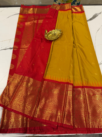 VG2 semi Gadwal mustard yellow and red border saree
