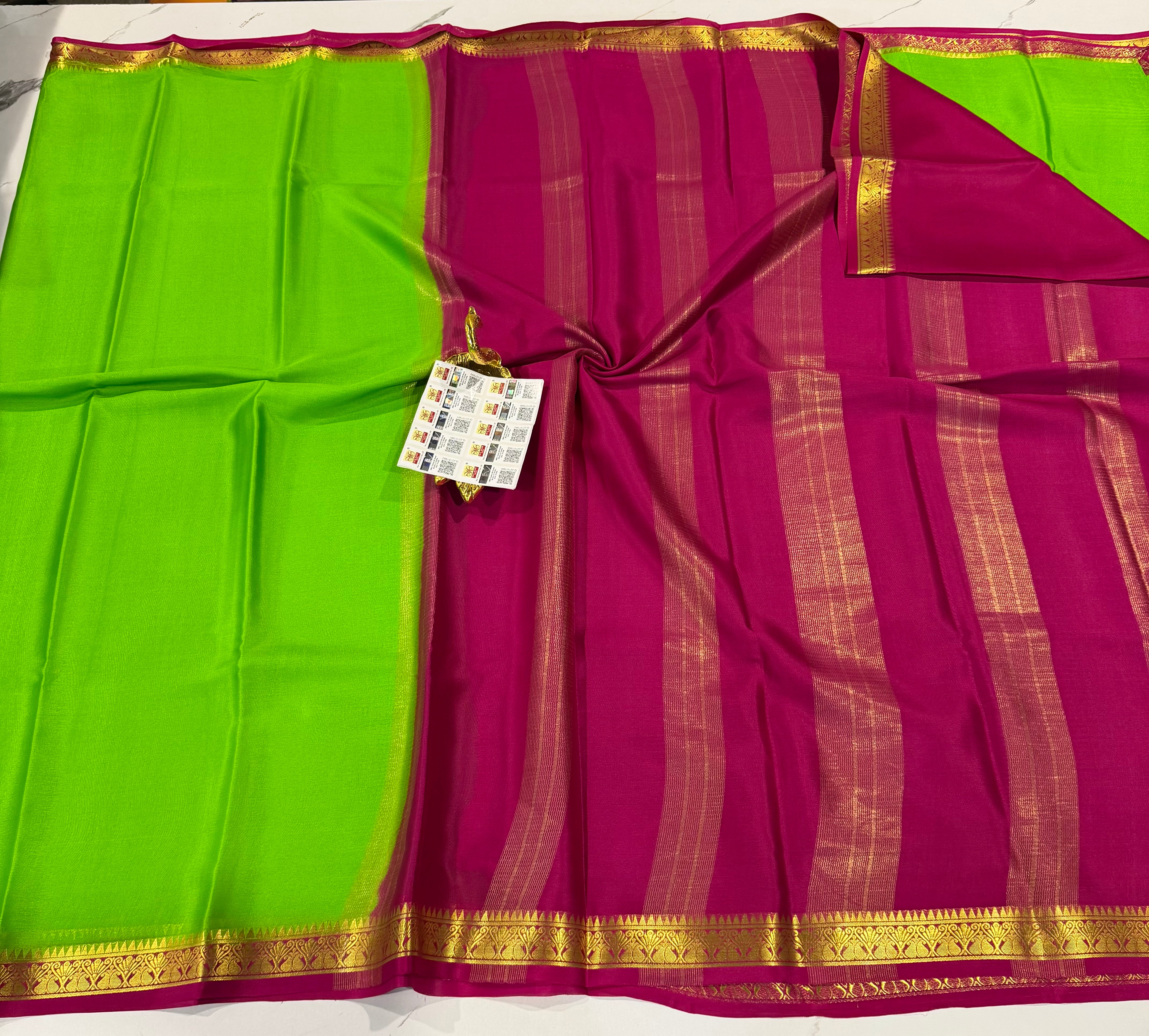 PM- 5700 green and pink border Mysore crepe silk saree
