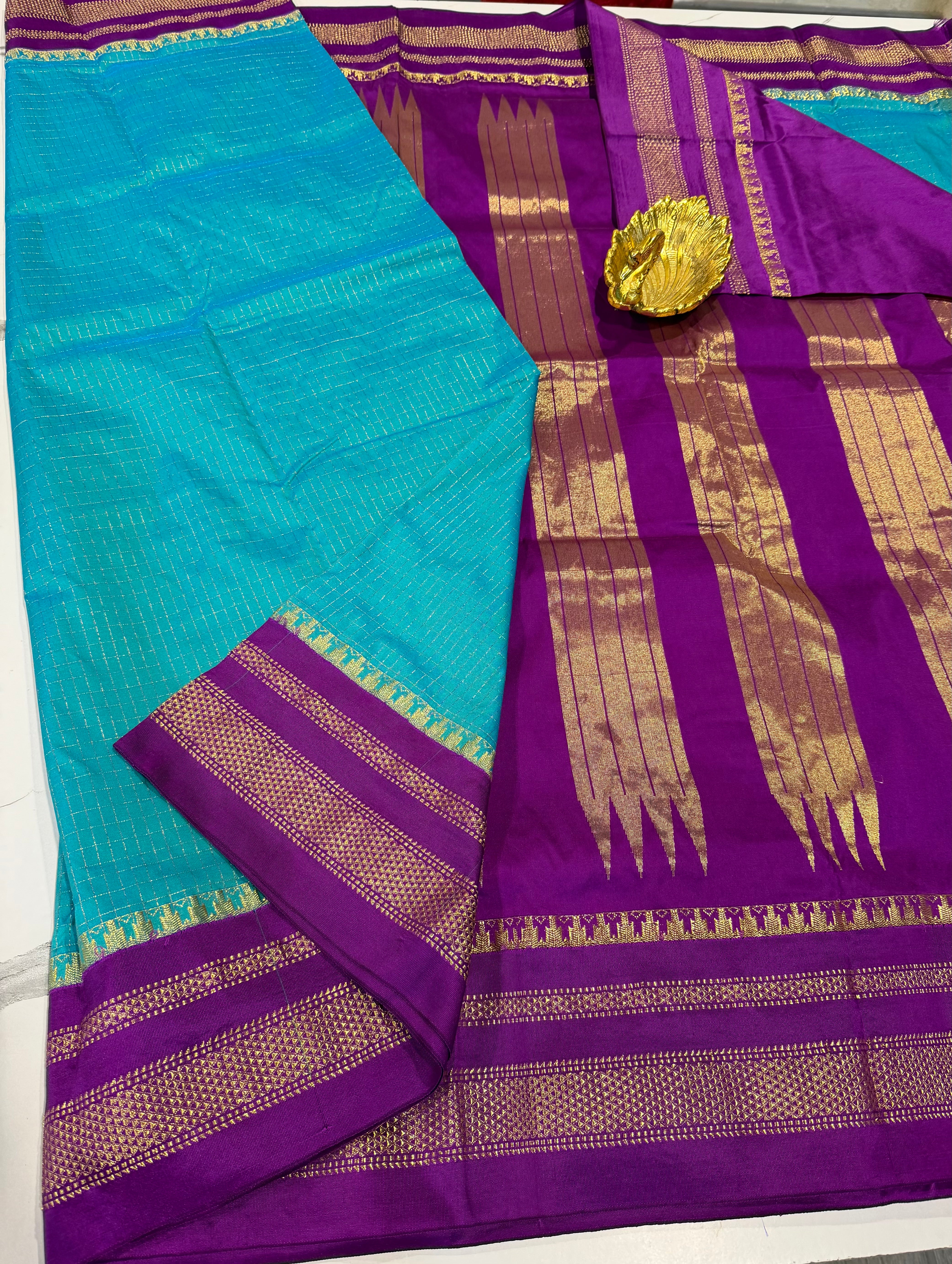 LD-NG25
 sea blue and purple border saree