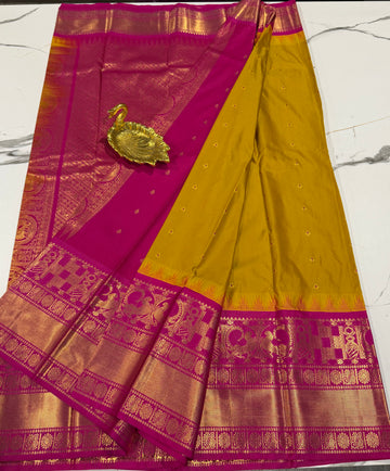 VG2 semi Gadwal mustard yellow and pink saree