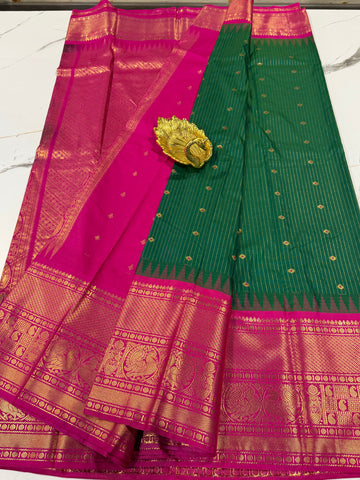 VG2 semi Gadwal green with lines and pink border saree