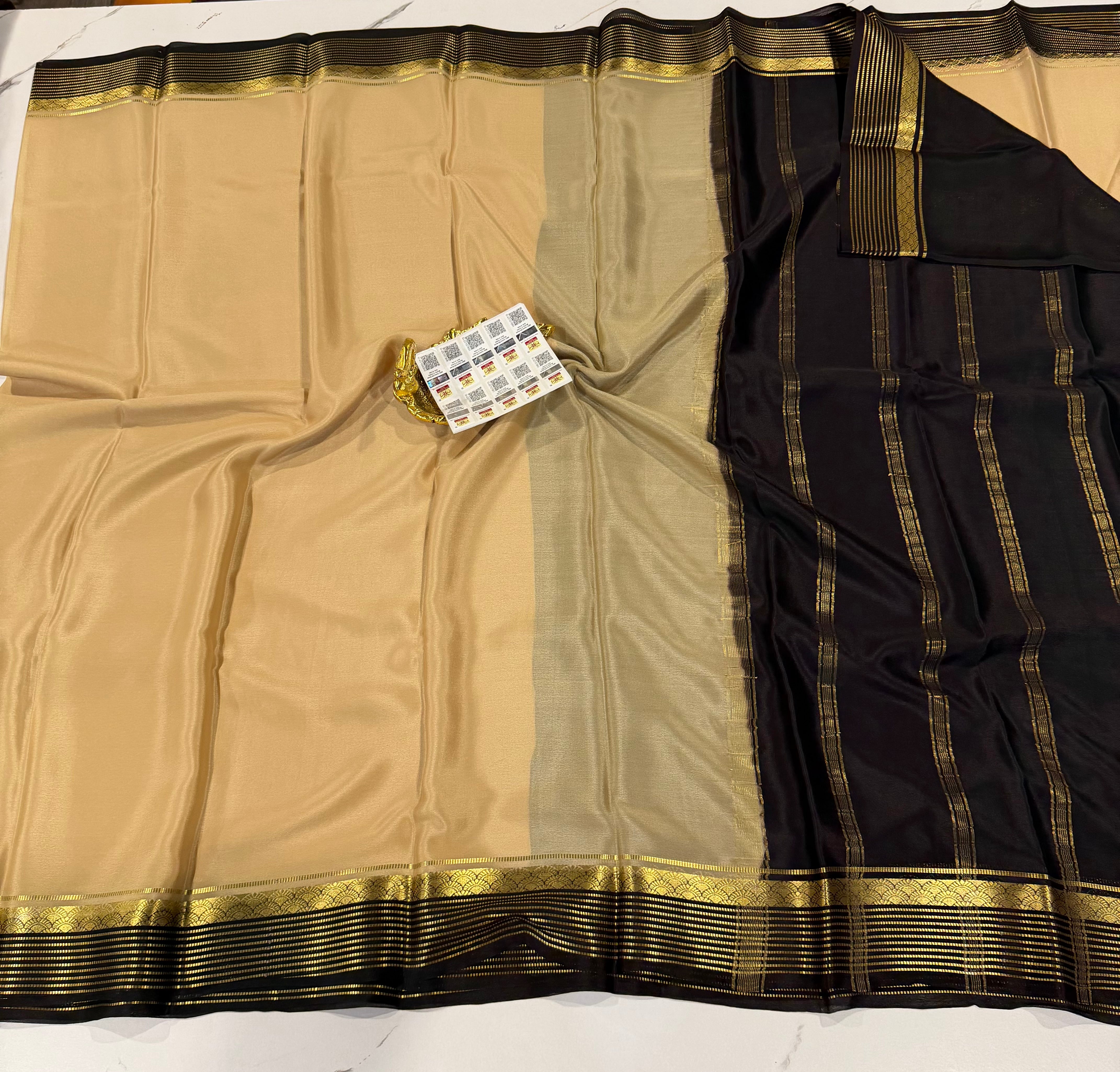 PM- 5700 cream and black border Mysore crepe silk saree