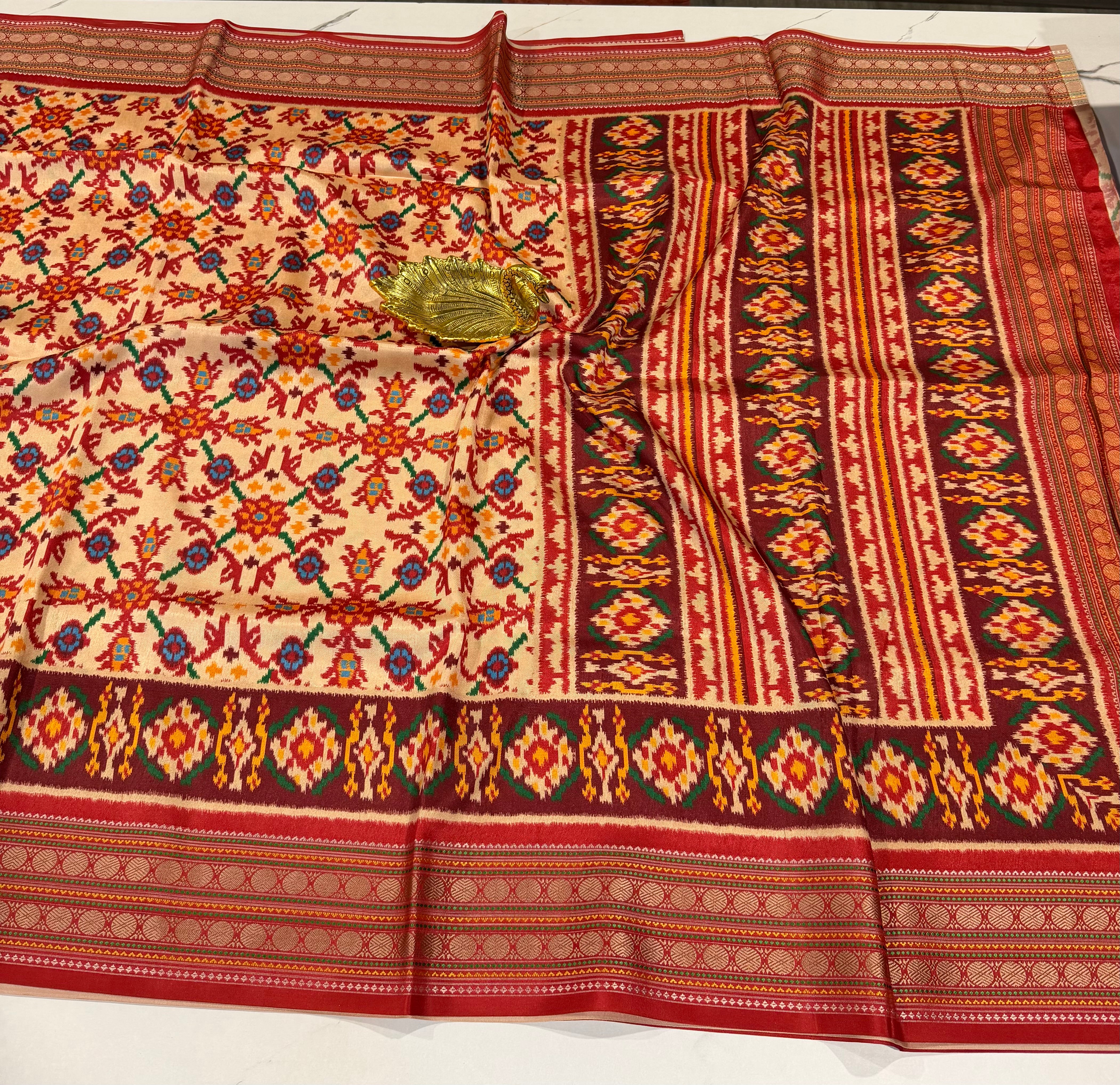 LD-1399 Rudraksha borders spun Patola cream saree