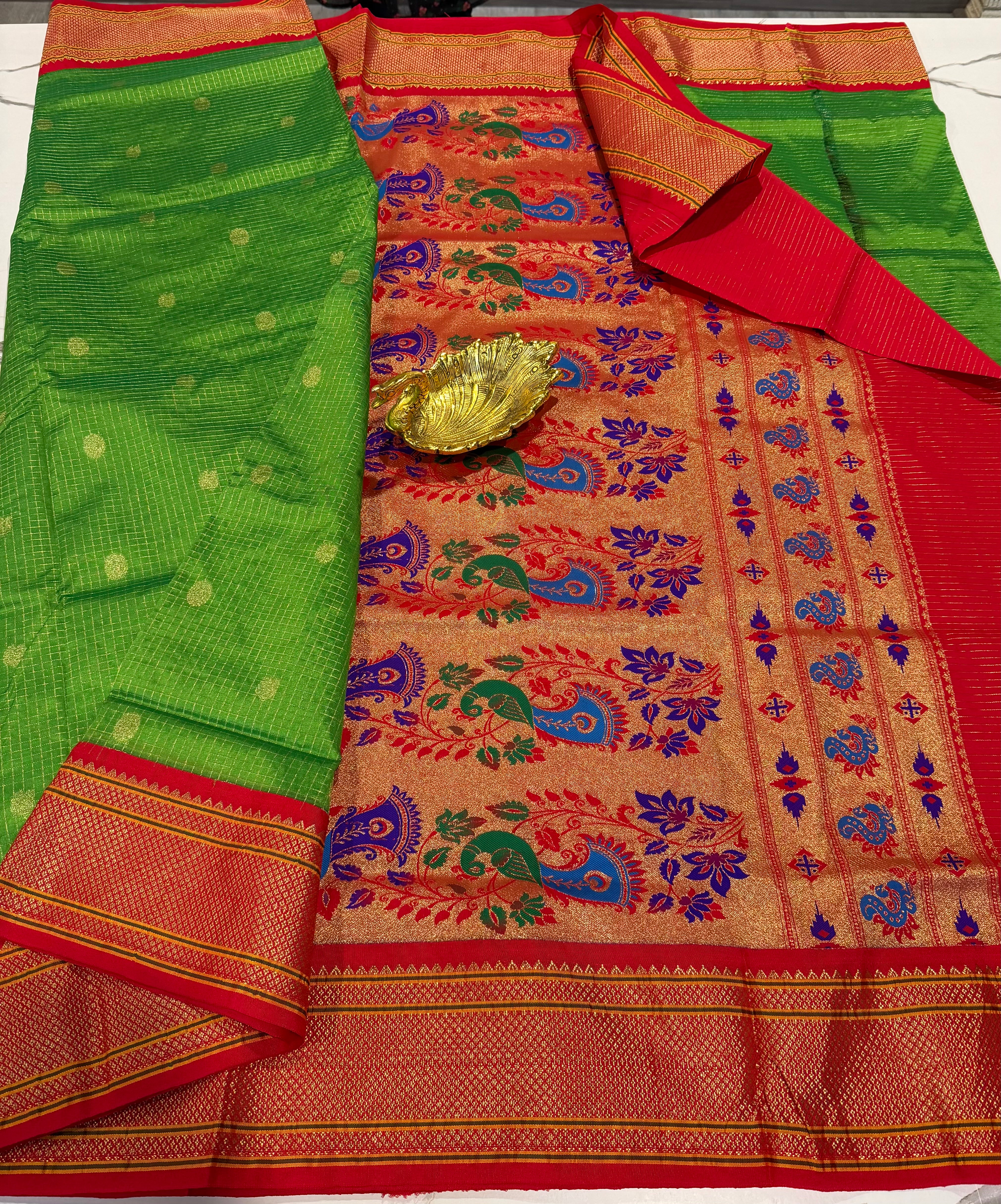 LD-SN35 
green colour and red border saree
