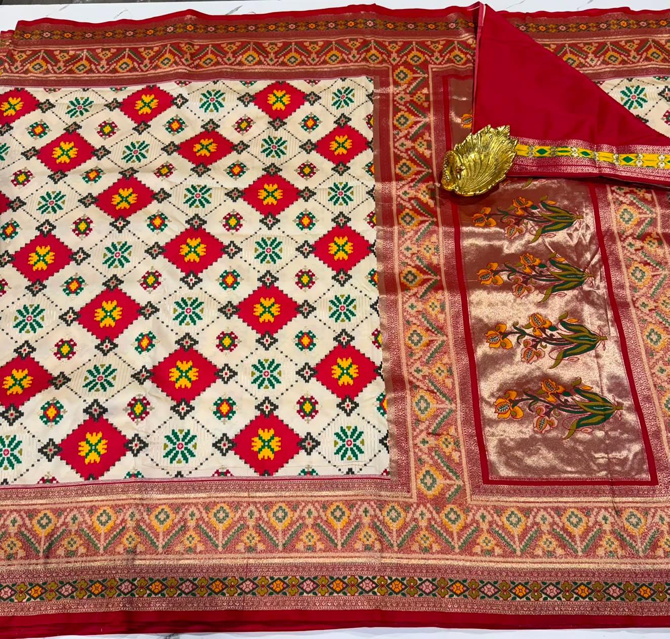 TT-3750 Patola cream and red tissue border saree
