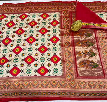 TT-3750 Patola cream and red tissue border saree