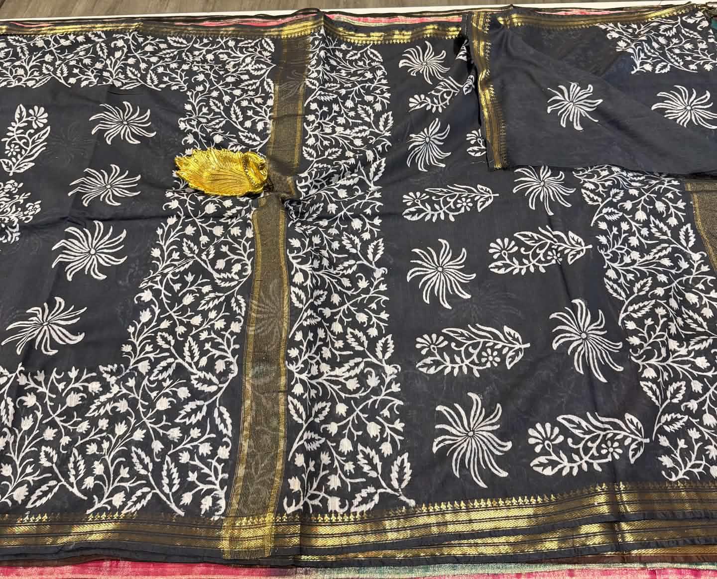Cs2  Black colour with gold border saree